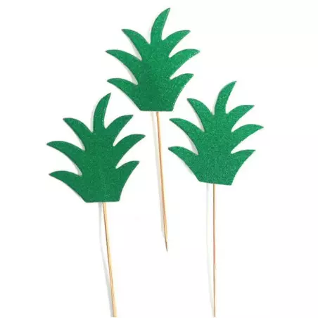 3 cake toppers with jungle leaves